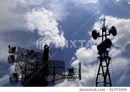 Air defense radars of military mobile anti aircraft systems, modern army industry on background beautiful clouds and sky, Russia 92455846