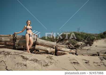 blond woman tanning blond woman tanning 92457866