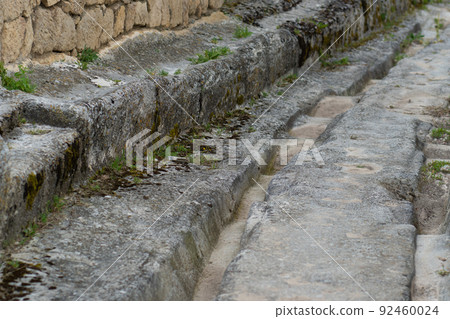 Ancient road chufut cave city bakhchisaray crimea medieval fortress stone, concept landscape blue in architecture for travel chufut, mountain karaite. View scene moutain, Ancient road chufut cave city bakhchisaray crimea medieval fortress stone, concept landscape blue in architecture for travel chufut, mountain karaite. View scene moutain, 92460024