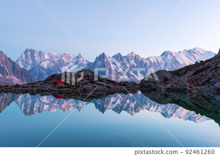 Red tent on Lac Blanc lake 92461260