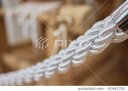 Nautical mooring line rope on the jetty. Curled mooring line. Nautical mooring line rope on the jetty. Curled mooring line. 92461702