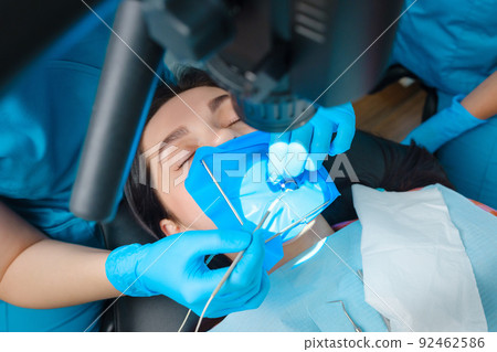 Photo endodontic treatment of dental canals 92462586