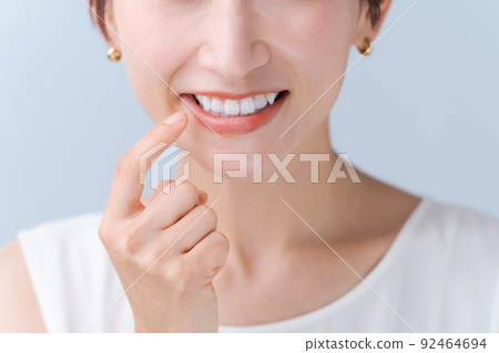 Woman checking teeth 92464694