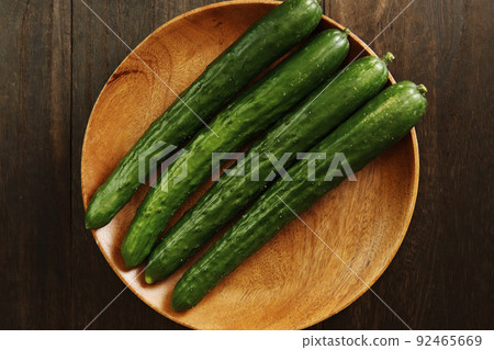 Cucumber with light-colored vegetables in the freshly picked salad on the table that goes well with raw vegetable mayonnaise Cucumber with light-colored vegetables in the freshly picked salad on the table that goes well with raw vegetable mayonnaise 92465669