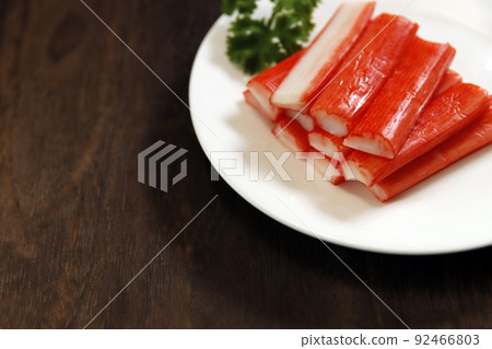 Crab stick, an ingredient of Japanese cuisine that imitates the low-calorie crab that is popular for salads and side dishes on the table 92466803