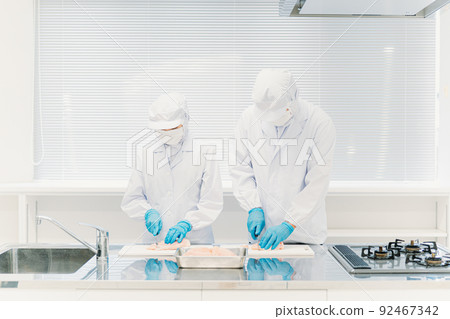 Men and women of workers working in food processing (meat and food factories) 92467342
