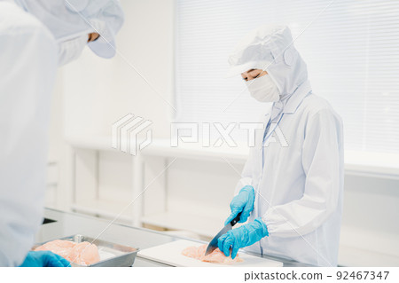 Men and women of workers working in food processing (meat and food factories) 92467347