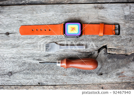 Orange leather smart watch strap hand made on wood 92467940