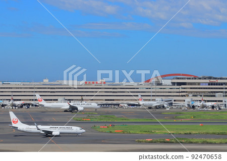 Passenger plane heading to the runway Jet plane Airport travel image Departure image 92470658