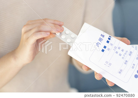 Young women taking medicine Body parts Parts cut 92470880