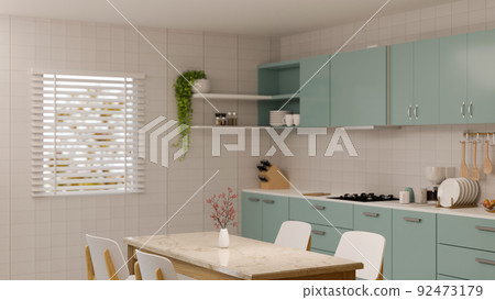 Modern minimal home kitchen interior with white dining table, light blue kitchen countertop Modern minimal home kitchen interior with white dining table, light blue kitchen countertop 92473179