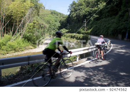 Touring along the river 92474562