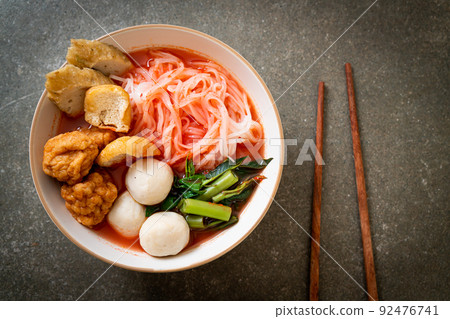 small flat rice noodles with fish balls and shrimp balls in pink soup, Yen Ta Four or Yen Ta Fo small flat rice noodles with fish balls and shrimp balls in pink soup, Yen Ta Four or Yen Ta Fo 92476741