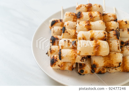grilled tube shaped fish paste cake skewe or tube squid skewer grilled tube shaped fish paste cake skewe or tube squid skewer 92477246