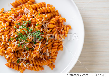 spirali or spiral pasta with tomato sauce spirali or spiral pasta with tomato sauce 92477618