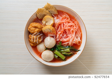 small flat rice noodles with fish balls and shrimp balls in pink soup, Yen Ta Four or Yen Ta Fo small flat rice noodles with fish balls and shrimp balls in pink soup, Yen Ta Four or Yen Ta Fo 92477654