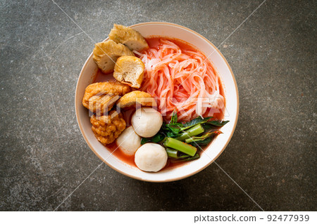 small flat rice noodles with fish balls and shrimp balls in pink soup, Yen Ta Four or Yen Ta Fo small flat rice noodles with fish balls and shrimp balls in pink soup, Yen Ta Four or Yen Ta Fo 92477939