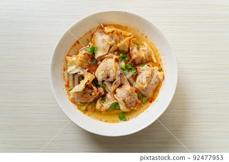 pork wonton soup or pork dumplings soup with roasted chili 92477953
