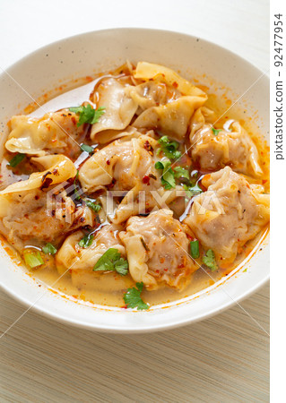 pork wonton soup or pork dumplings soup with roasted chili 92477954