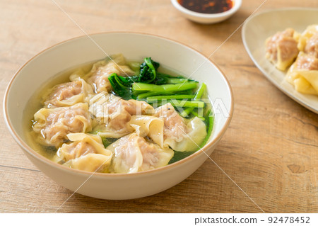 pork wonton soup or pork dumplings soup with vegetable 92478452