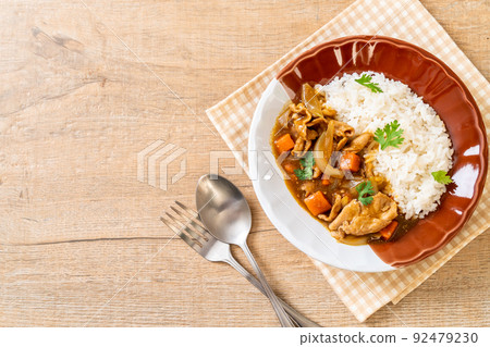Japanese curry rice with sliced pork, carrot and onions Japanese curry rice with sliced pork, carrot and onions 92479230
