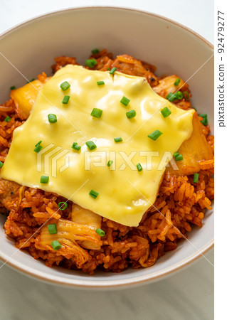 kimchi fried rice with pork and topped cheese 92479277