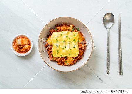 kimchi fried rice with pork and topped cheese 92479282