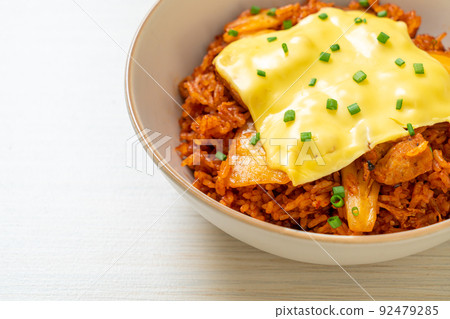 kimchi fried rice with pork and topped cheese 92479285