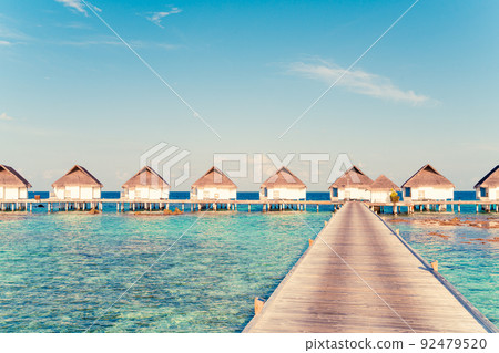 Beautiful tropical Maldives resort hotel and island with beach and sea Beautiful tropical Maldives resort hotel and island with beach and sea 92479520