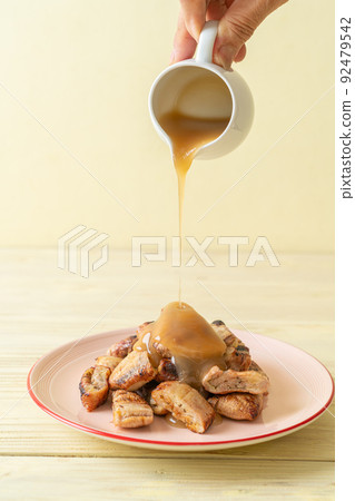 grilled bananas with coconut caramel sauce grilled bananas with coconut caramel sauce 92479542