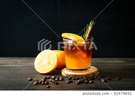 black coffee with orange and lemon juice 92479691
