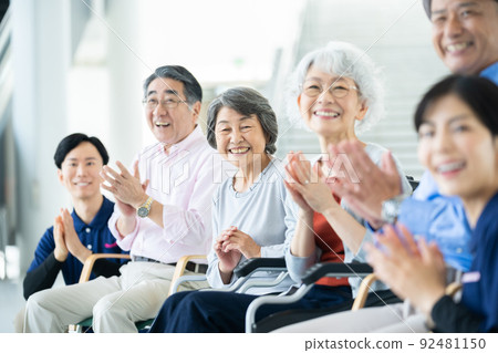 Elderly housing with care users watching the offerings Senior image Caregiver 92481150