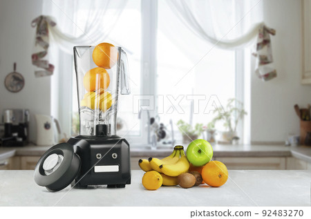 Blender and fruits on kitchen space 92483270