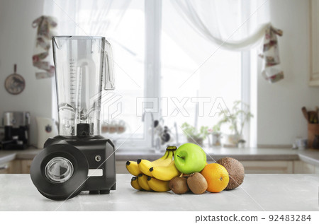 Blender, fruits and kitchen space Blender, fruits and kitchen space 92483284