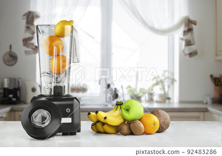Blender, fruits and kitchen space Blender, fruits and kitchen space 92483286