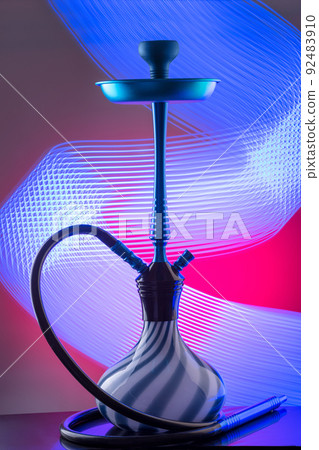 Blue eastern hookah on colorful background Blue eastern hookah on colorful background 92483910