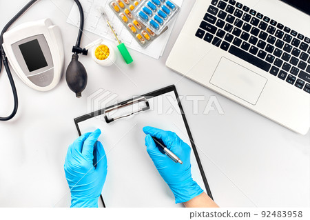 Doctor s table, tools, medical instruments, therapist tonometer, blood pressure, work in hospital on white background flat lay 92483958