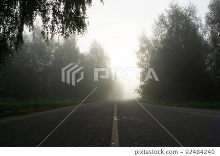 Foggy rural road Foggy rural road 92484240