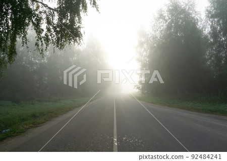 Foggy rural road Foggy rural road 92484241