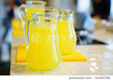 Juice In Glass Jar And Orange On Kitchen Table. Stock Photo, Picture and  Royalty Free Image. Image 14167034.