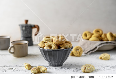 Sweet Italian cookies Taralli made with white wine, sugar, olive oil, eggs and flour 92484706