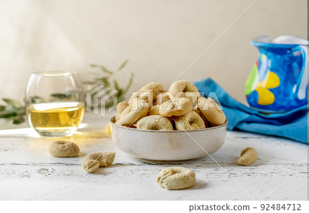 Sweet Italian cookies Taralli made with white wine, sugar, olive oil, eggs and flour Sweet Italian cookies Taralli made with white wine, sugar, olive oil, eggs and flour 92484712