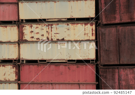 Rusted iron boxes are piled up 92485147
