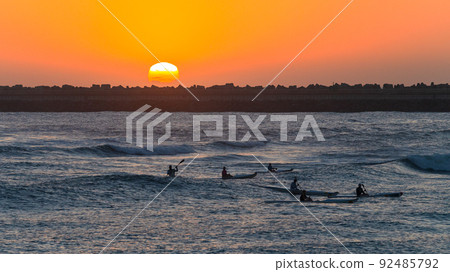 Surf-ski Paddlers Ocean Sunrise Surf-ski Paddlers Ocean Sunrise 92485792