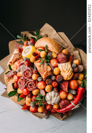 Delicious edible bouquet of sausage, tomatoes, cheese. Gift for man. 92485952