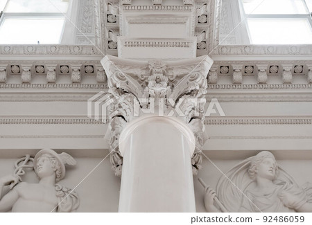Elements of architectural decorations of buildings, columns and tops, old gypsum stucco molding Elements of architectural decorations of buildings, columns and tops, old gypsum stucco molding 92486059