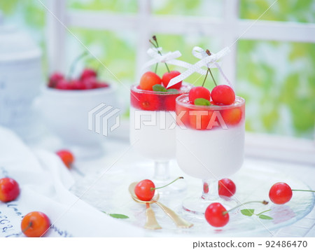Glass sweets cherry milk pudding Glass sweets cherry milk pudding 92486470