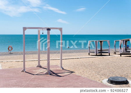 Shower handicapped beach summer sign sea water sky travel vacation, concept sun head for drop from scenic sunny, resort joy. Taking heat, 92486827