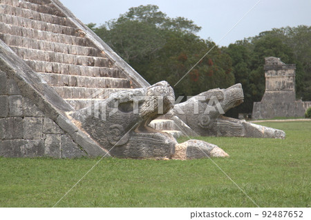 Jaguar carvings at the base of Chichen Itza 92487652