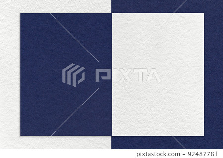 Texture of white and navy blue paper background with geometric shape and pattern. Structure of craft denim cardboard Texture of white and navy blue paper background with geometric shape and pattern. Structure of craft denim cardboard 92487781